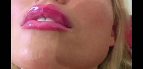 Busty stocking wearing blonde striptease